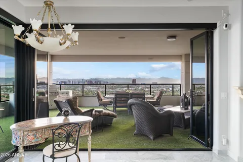 a view of a living room and dining room