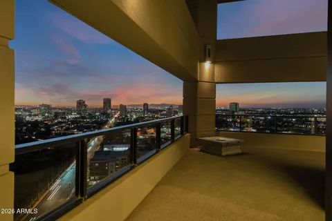 a view of roof deck with city view