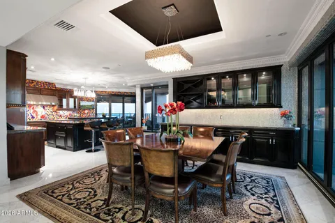 a view of a dining room with furniture