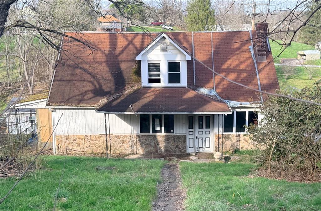 35 Florence Avenue Burgettstown, PA 15021 - Photo 1 of 5 a front view of a house with a yard