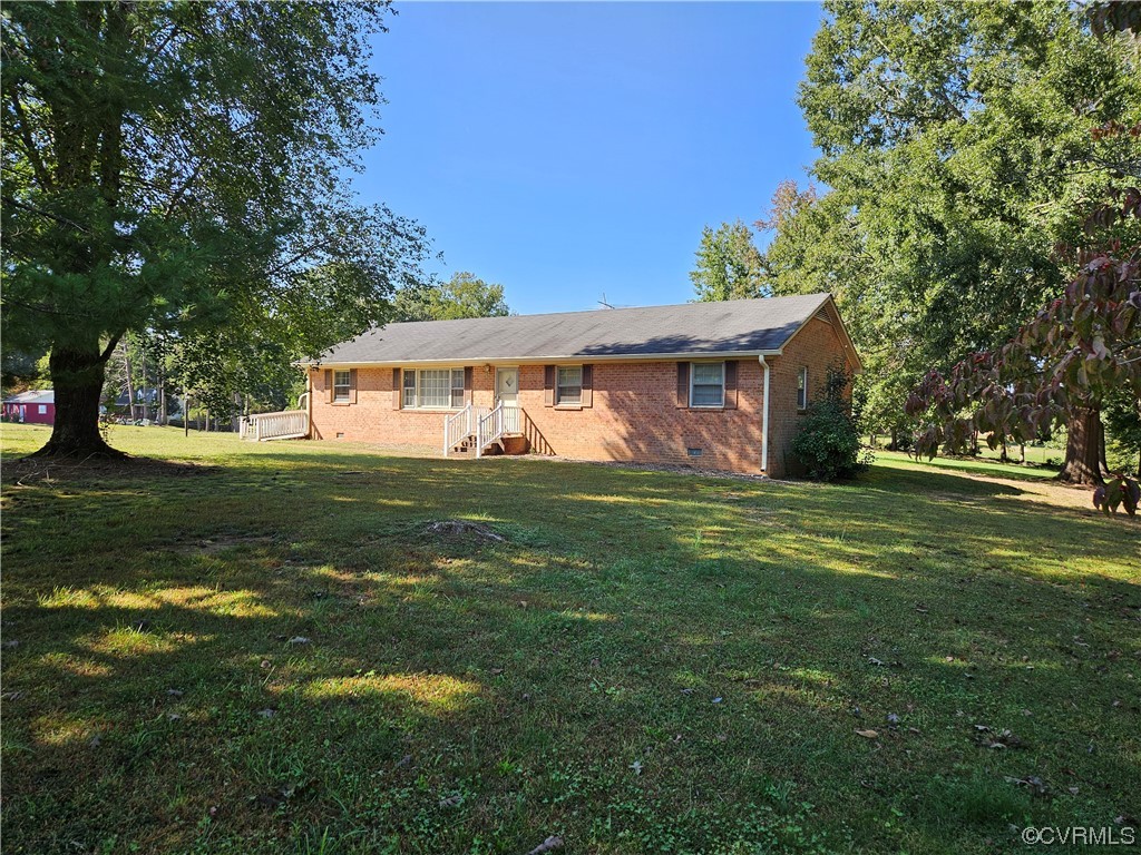 11310 Clement Town Road Amelia Court House, VA 23002 - Photo 2 of 32 a front view of house with yard and green space