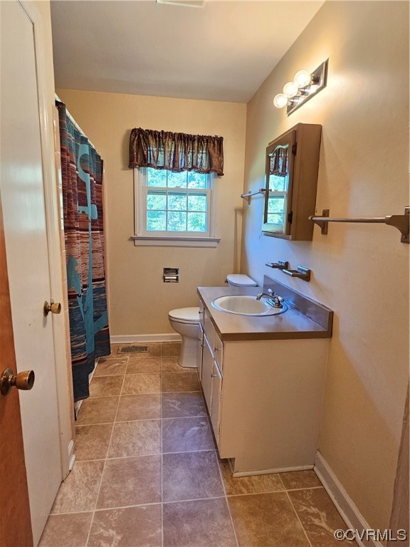 11310 Clement Town Road Amelia Court House, VA 23002 - Photo 29 of 32 a bathroom with a sink and a mirror