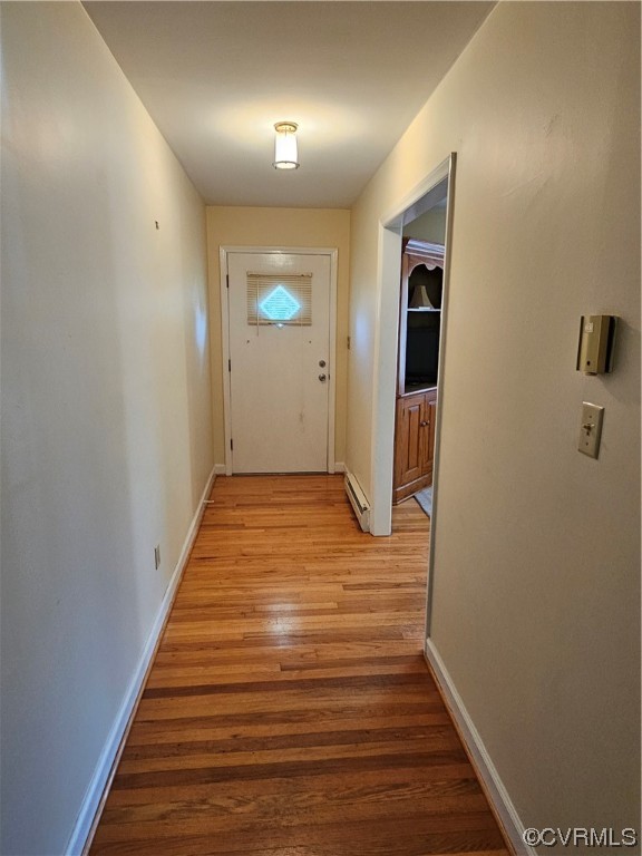 11310 Clement Town Road Amelia Court House, VA 23002 - Photo 32 of 32 a view of a hallway with wooden floor