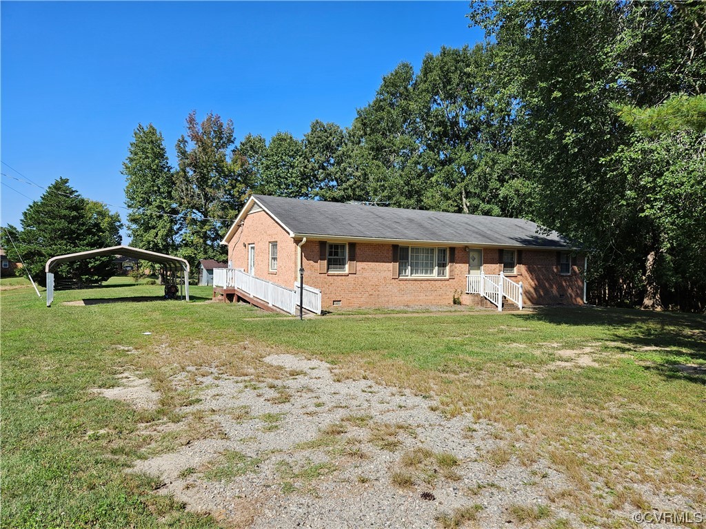 11310 Clement Town Road Amelia Court House, VA 23002 - Photo 4 of 32 a front view of a house with garden