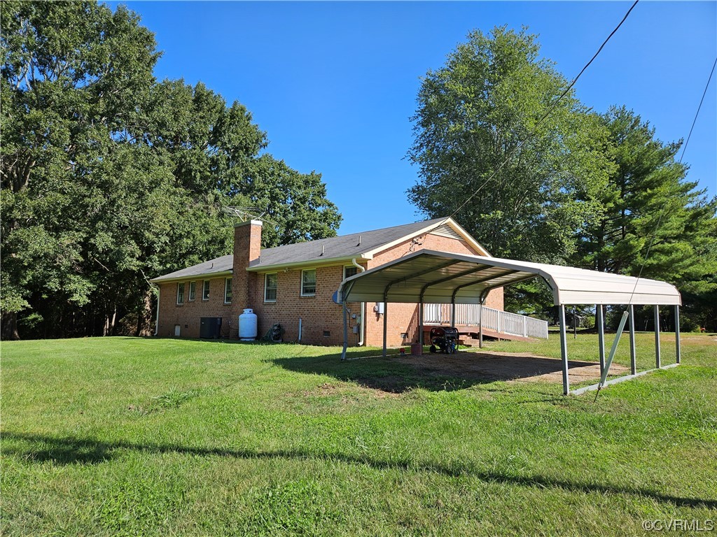 11310 Clement Town Road Amelia Court House, VA 23002 - Photo 7 of 32 a view of a house with a yard