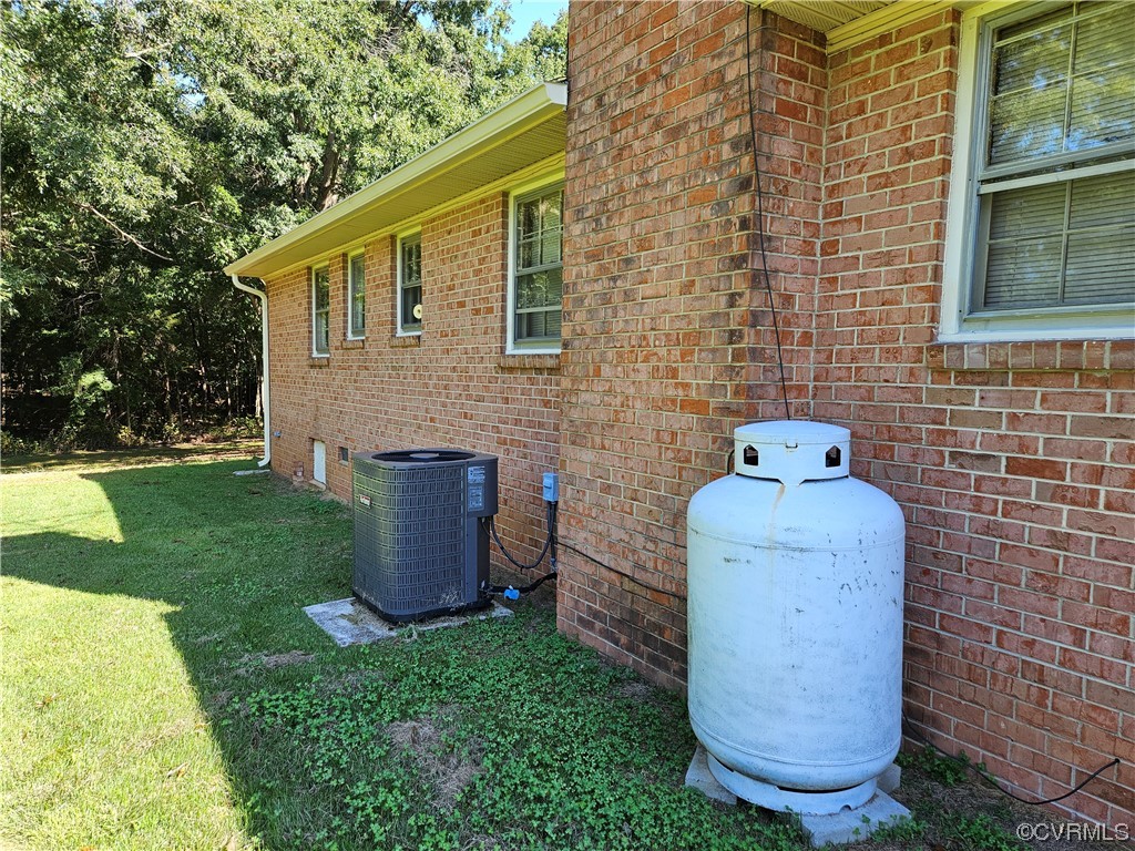 11310 Clement Town Road Amelia Court House, VA 23002 - Photo 8 of 32 a front view of a house with garden