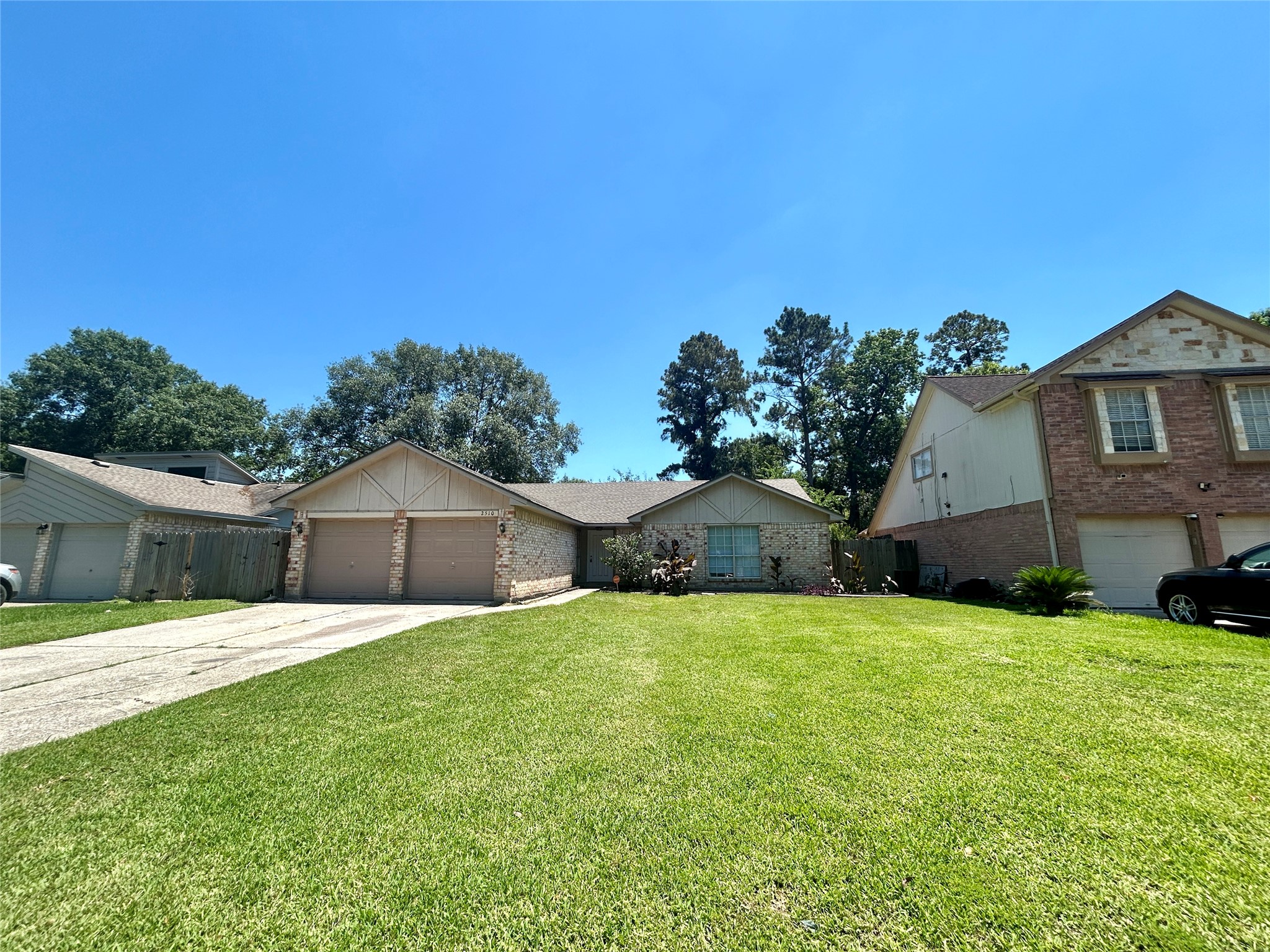 2510 Knollbrook Lane Spring, TX 77373 - Photo 3 of 24 a white house with a yard and a large tree