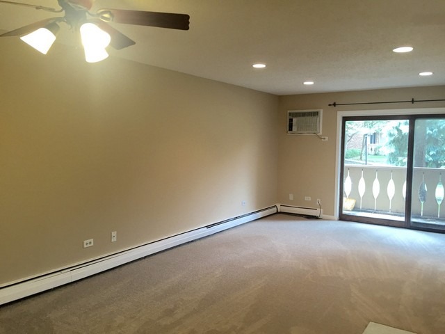 12 Parkside Court, Unit 4 Vernon Hills, IL 60061 - Photo 3 of 16 a view of an empty room with a window