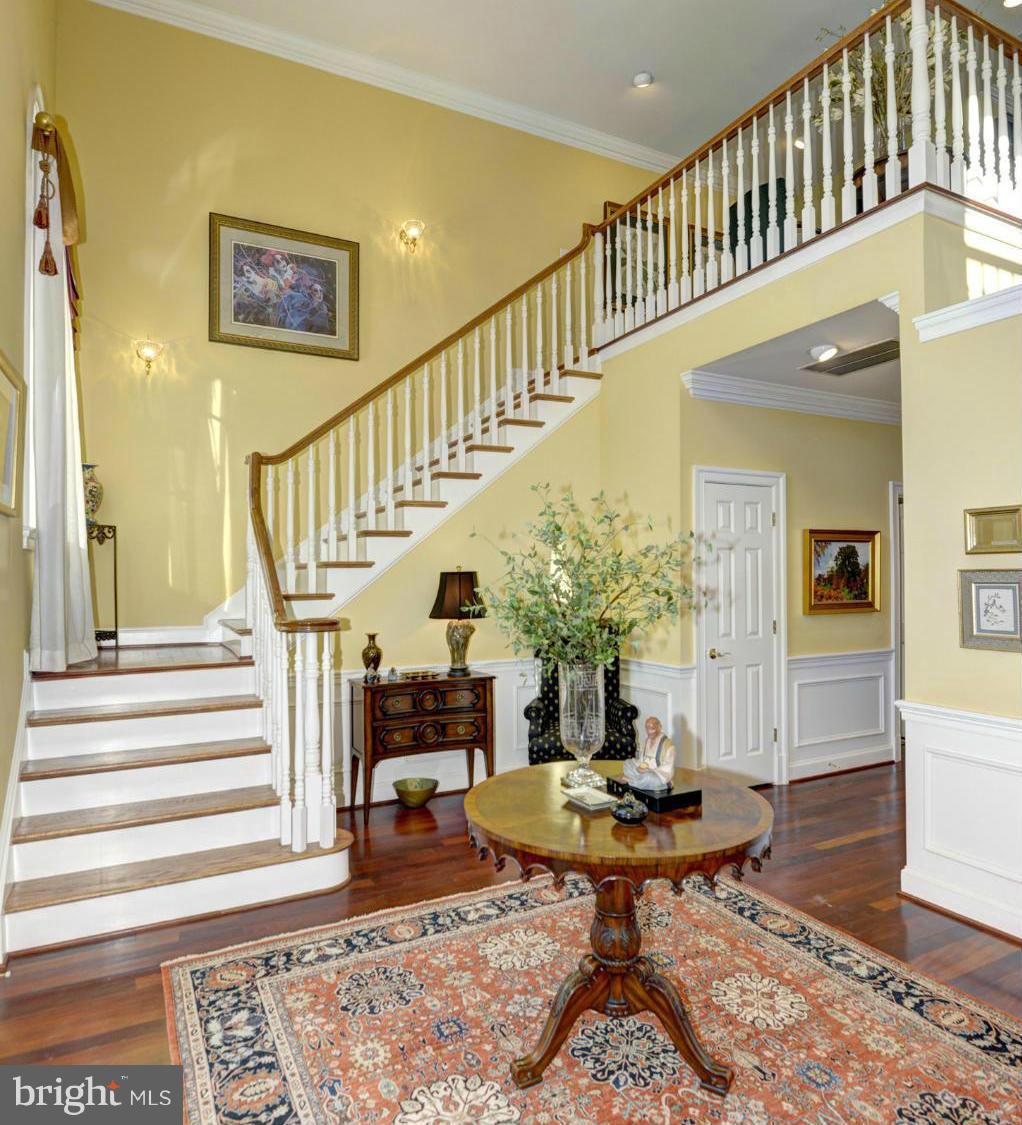 1925 South Arlington Ridge Road Arlington, VA 22202 - Photo 13 of 30 Curved staircase in the grand foyer