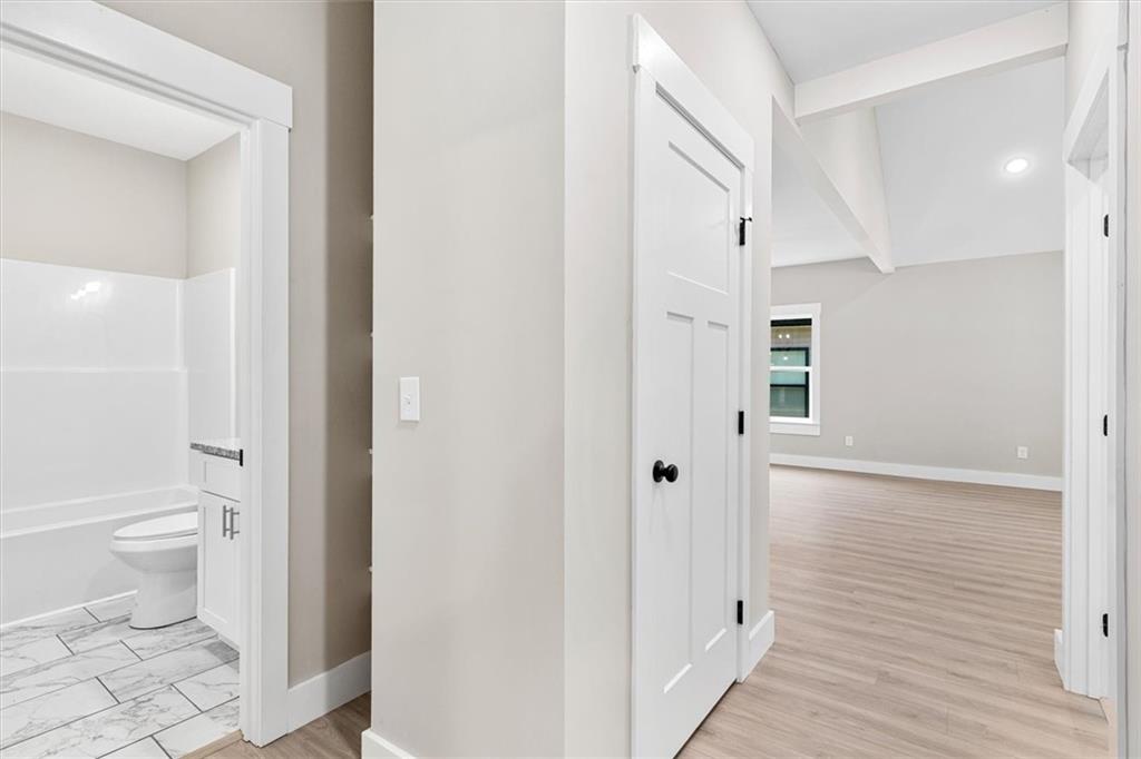 152 Washington Street Dalton, GA 30721 - Photo 31 of 40 a bathroom with a toilet and a shower