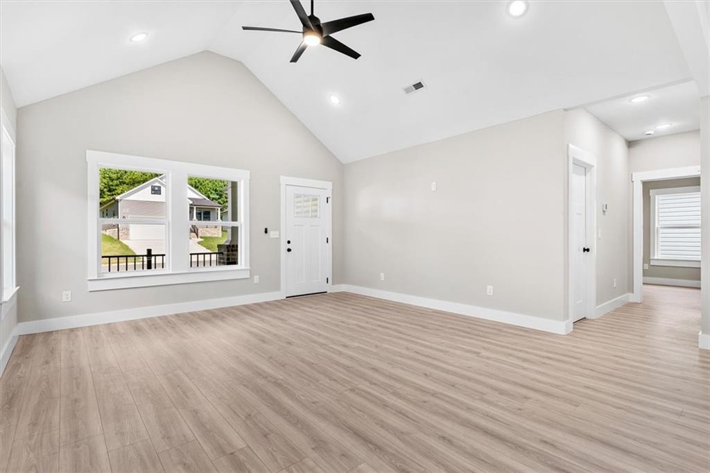152 Washington Street Dalton, GA 30721 - Photo 10 of 40 wooden floor in an empty room with a window