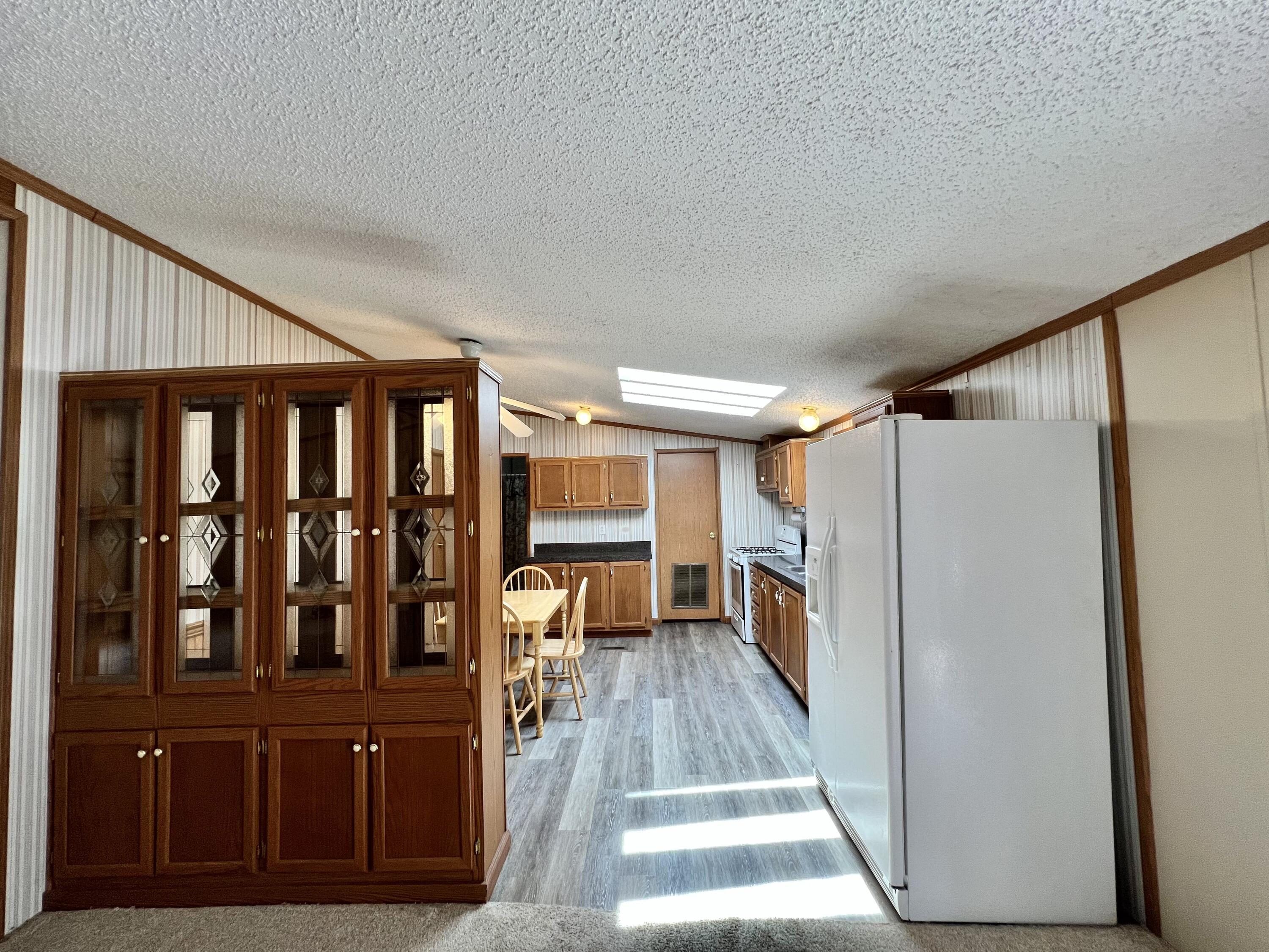1483 South Sullivan Road Ravenna, MI 49451 - Photo 13 of 32 Living room view to kitchen