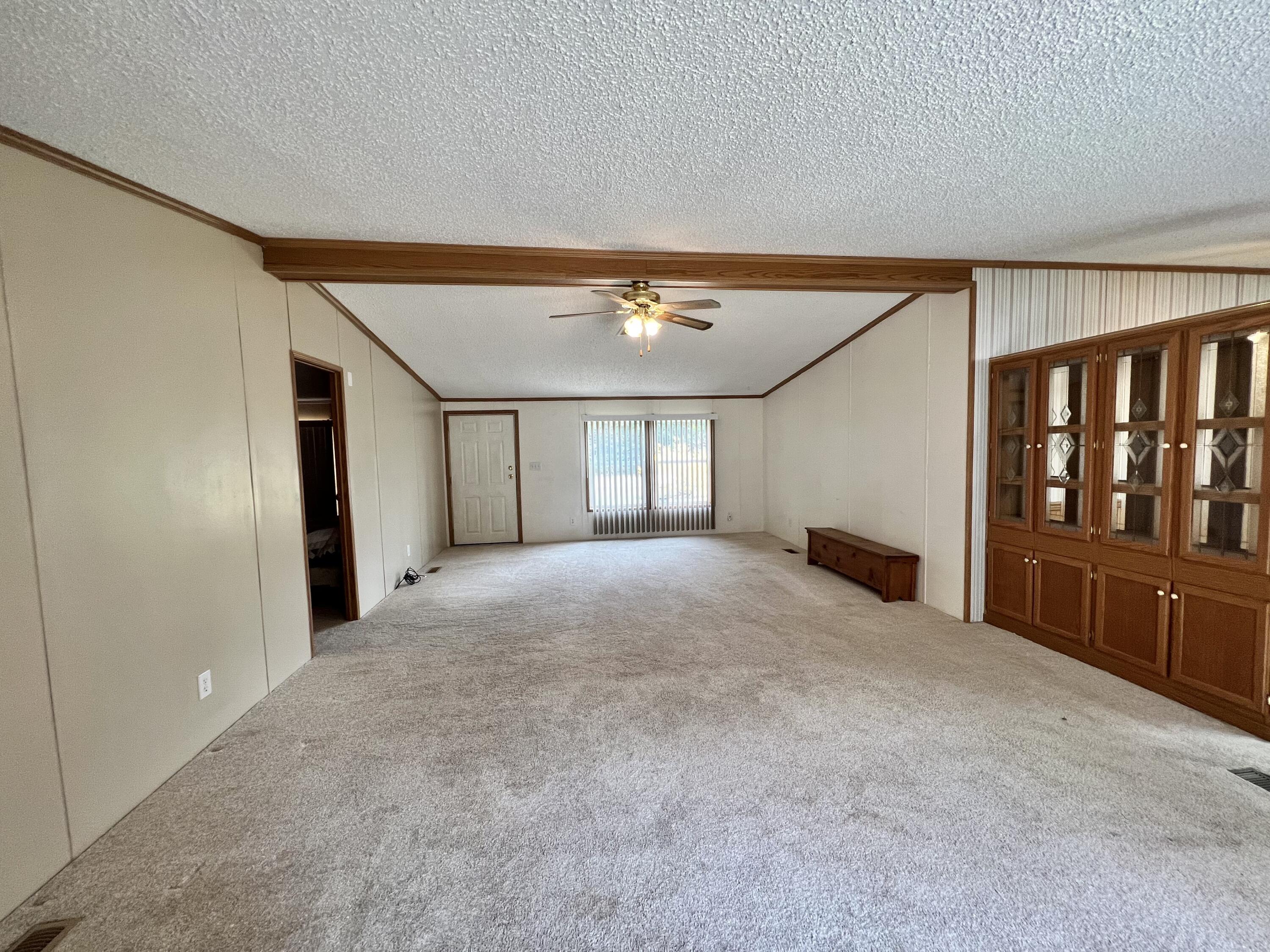 1483 South Sullivan Road Ravenna, MI 49451 - Photo 14 of 32 Living room view to front