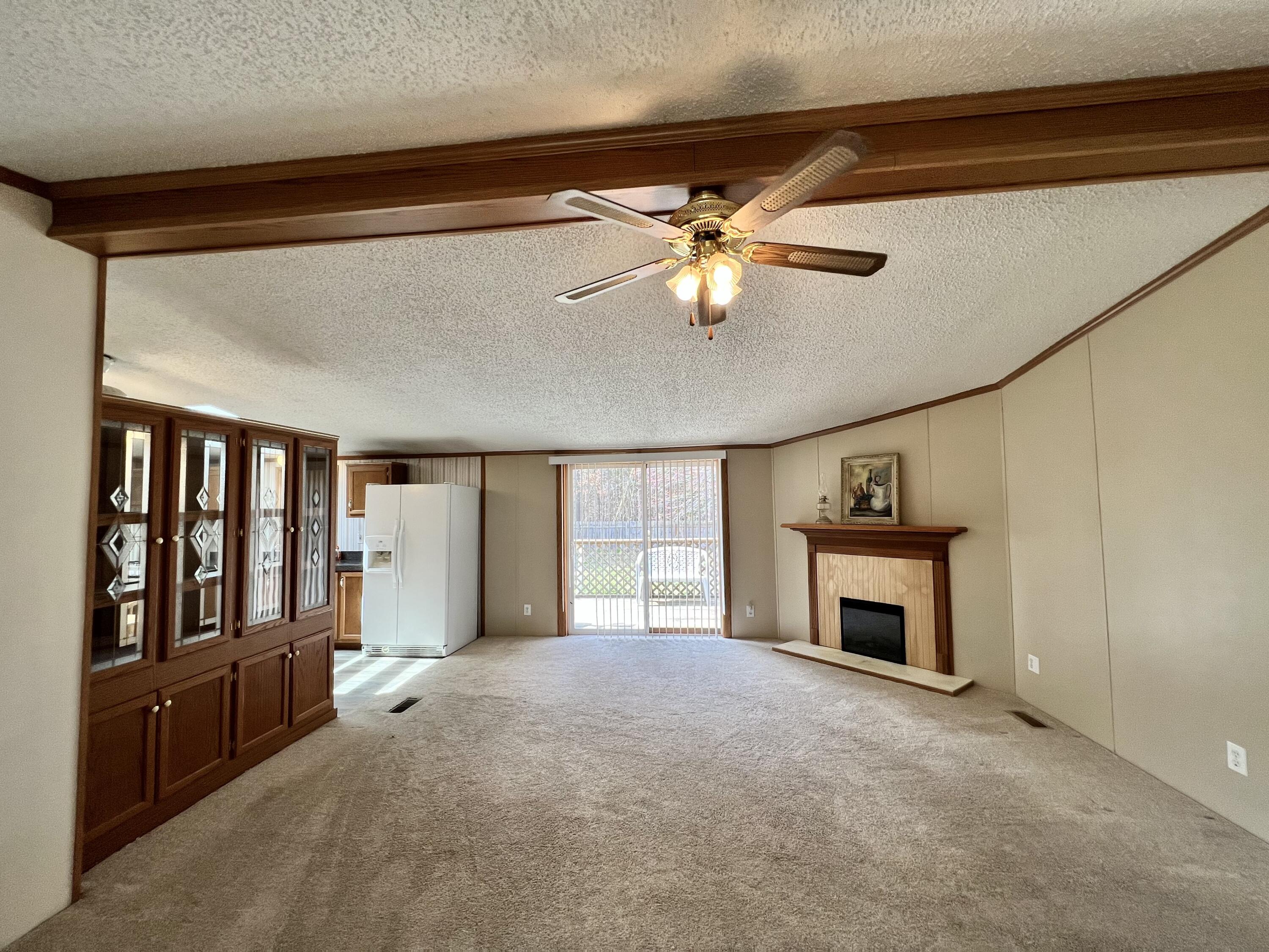 1483 South Sullivan Road Ravenna, MI 49451 - Photo 15 of 32 Living room view to back