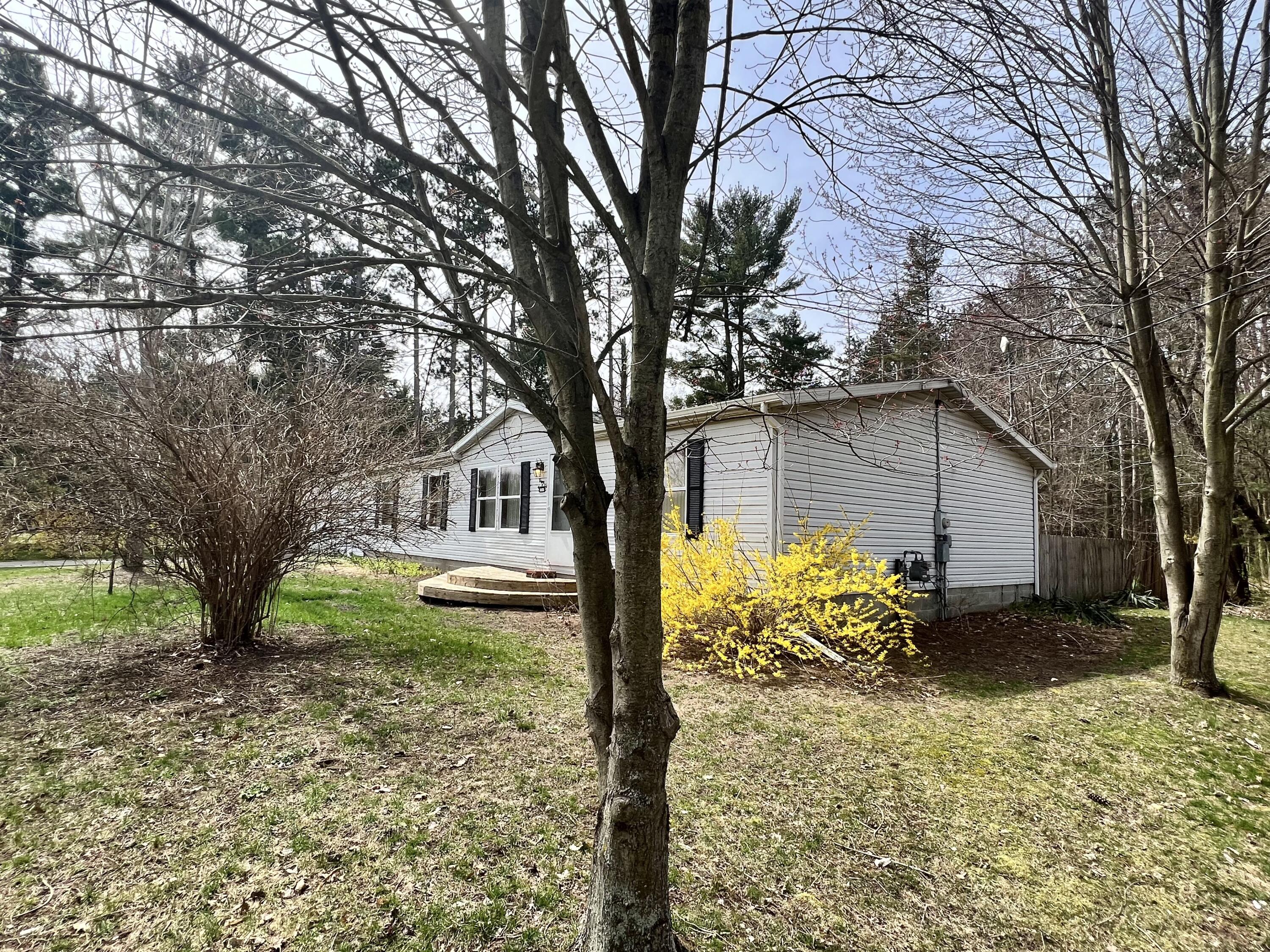 1483 South Sullivan Road Ravenna, MI 49451 - Photo 5 of 32 Side