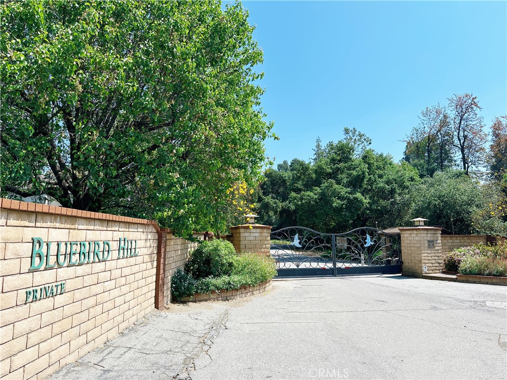 1826 Bluebird Road Glendora, CA 91741 - Photo 5 of 6 a front view of a building with trees