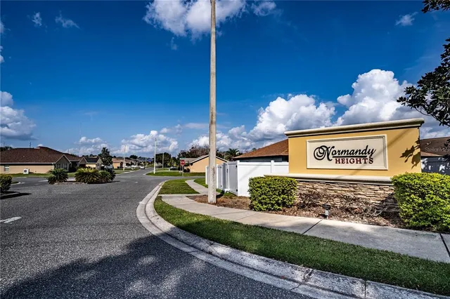 a view of a street with sign board