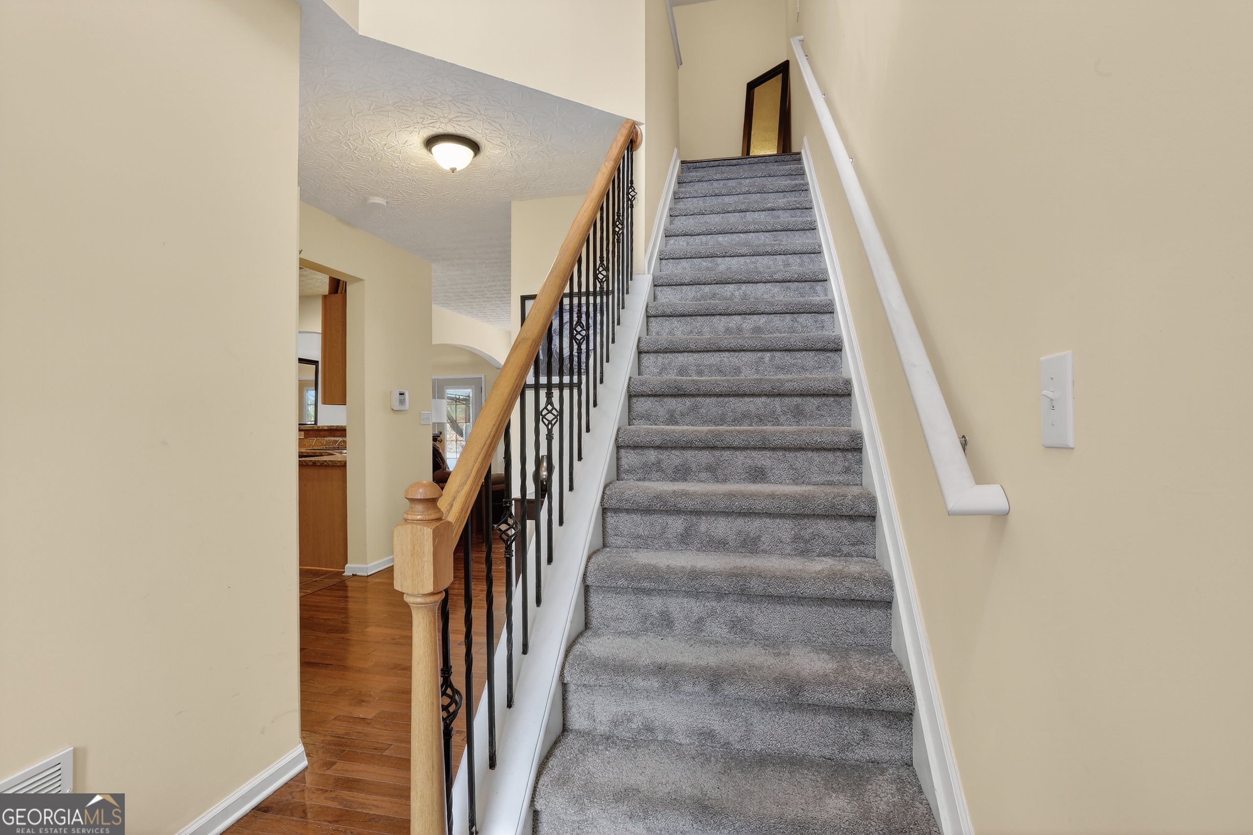 5556 Cascade Run South Fulton, GA 30336 - Photo 20 of 35 a view of a hallway with stairs