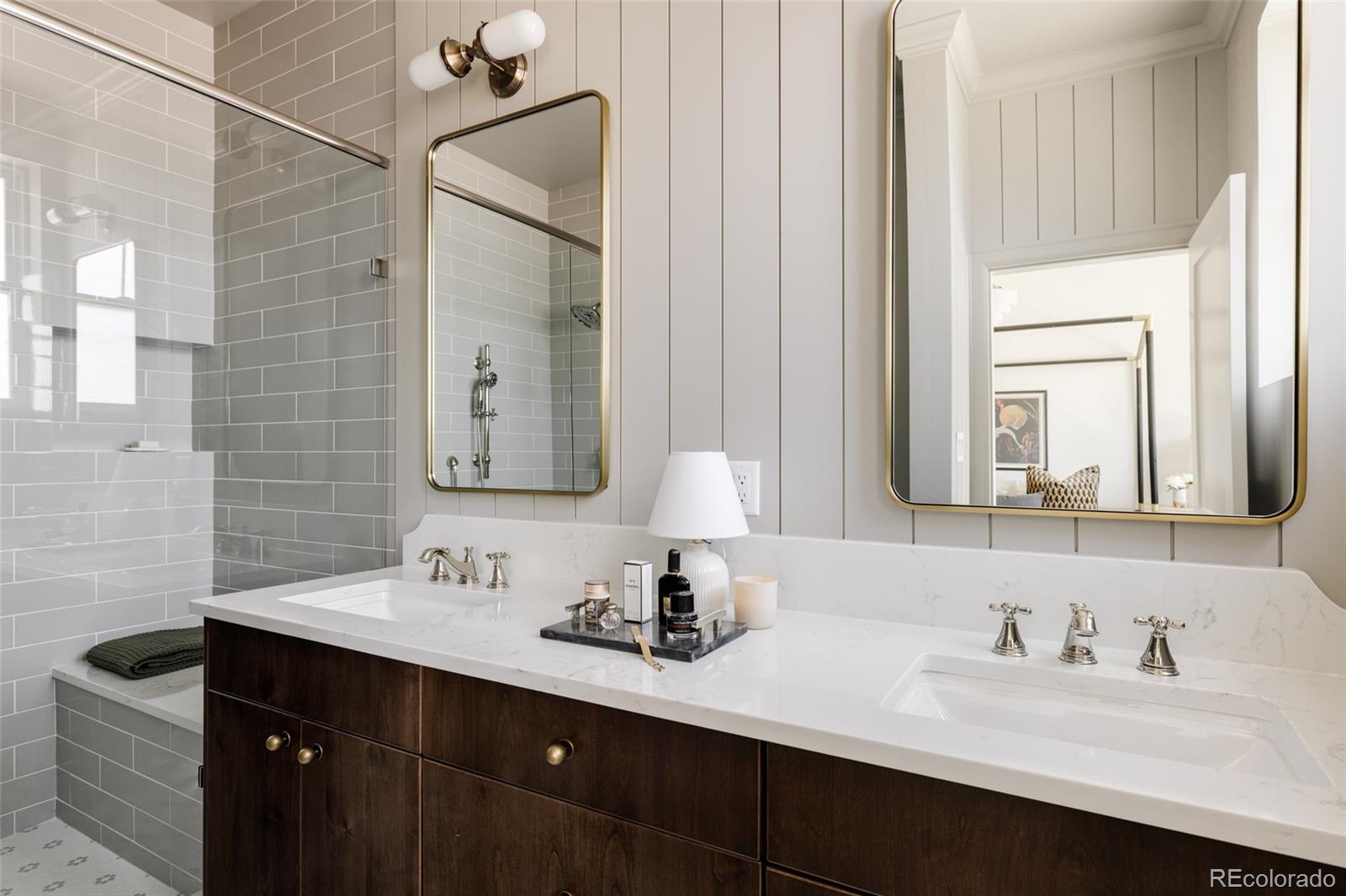 4131 Quivas Street Denver, CO 80211 - Photo 23 of 44 a bathroom with a sink vanity and a mirror