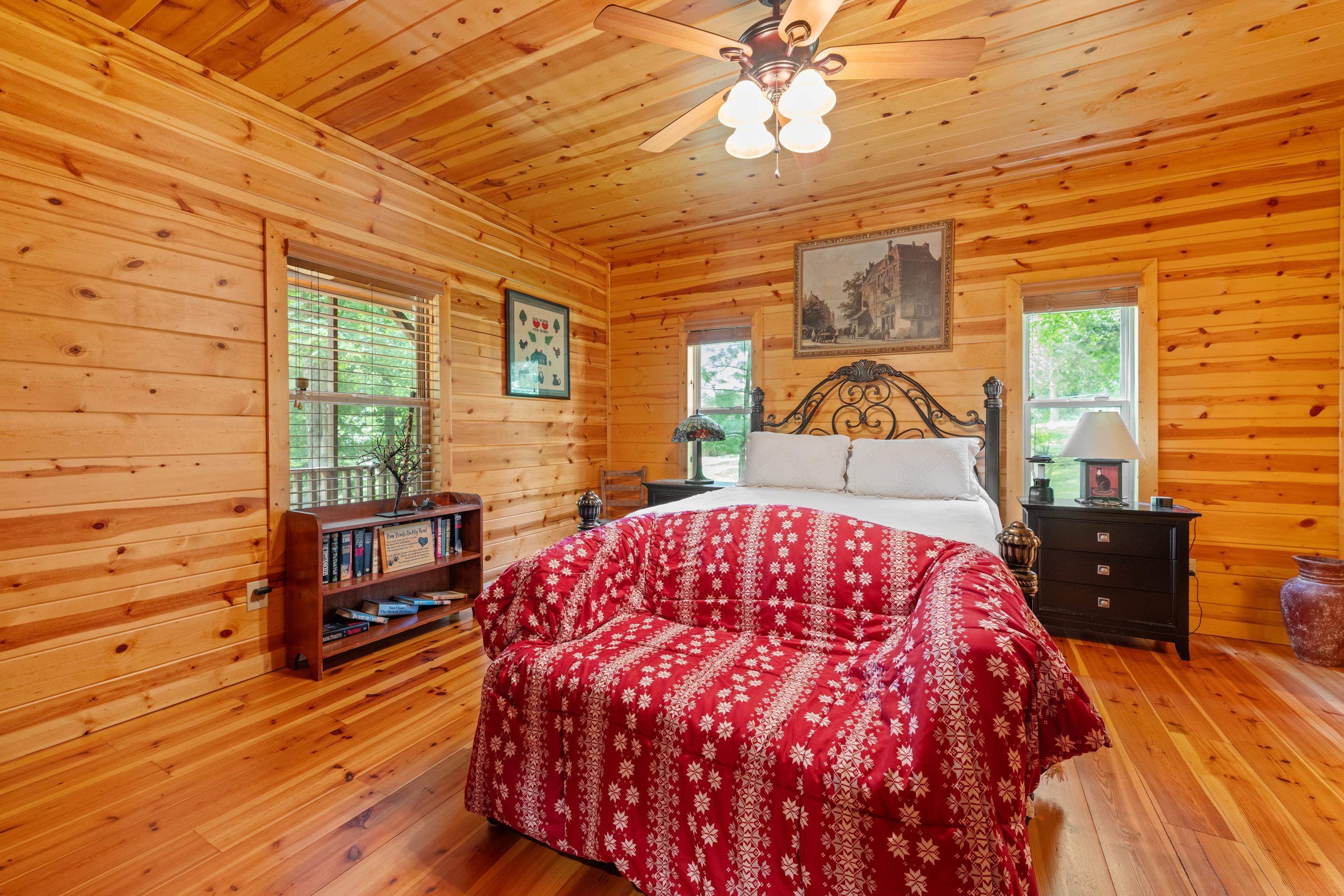 950 Cherry Road Eads, TN 38028 - Photo 10 of 30 Interior room featuring natural wood plank walls and wood-finish flooring
