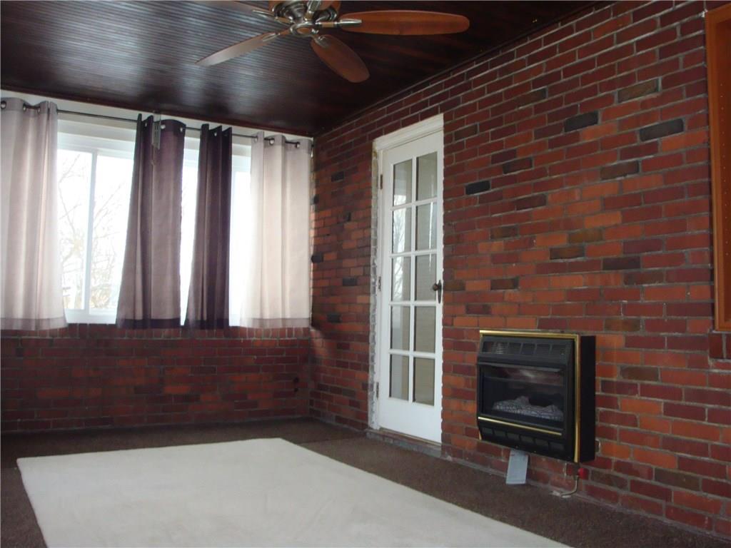 926 Braddock Road Forest Hills, PA 15221 - Photo 11 of 20 FAMILY ROOM W/CEILING FAN * ADDITIONAL SOURCE OF HEAT * GAS SPACE HEATER * HEAT REGISTER AS WELL