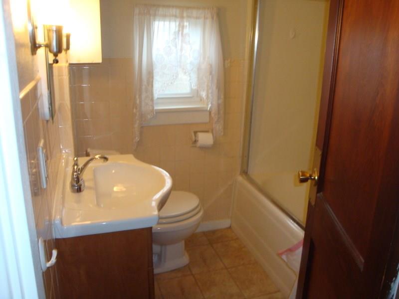 926 Braddock Road Forest Hills, PA 15221 - Photo 17 of 20 UPDATED FULL BATH * NEWER VANITY * CERAMIC FLOOR * NEW SHOWER DOORS