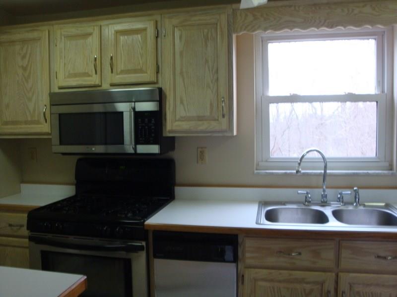 926 Braddock Road Forest Hills, PA 15221 - Photo 6 of 20 KITCHEN * CUSTOM OAK CABINETS * FULLY EQUIPPED W/STAINLESS STEEL APPLIANCES