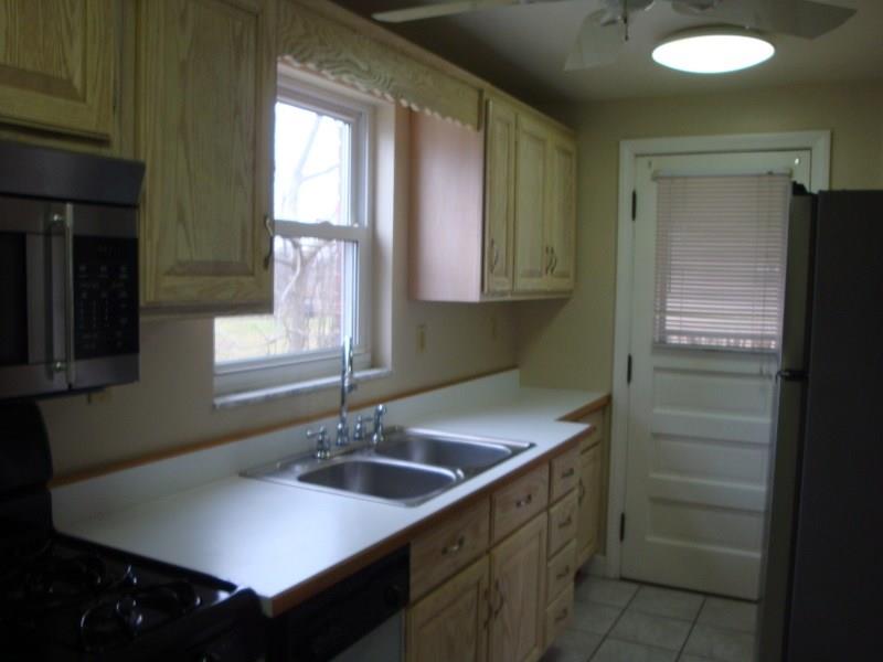 926 Braddock Road Forest Hills, PA 15221 - Photo 7 of 20 KITCHEN * DOOR W/NEW STORM DOOR TO SIDE PORCH