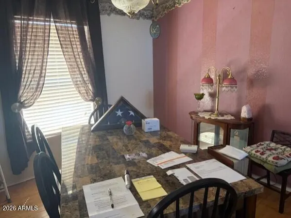 a view of a dining room with furniture