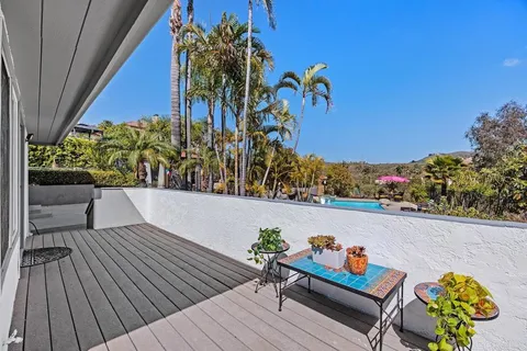 a view of a terrace with outdoor seating