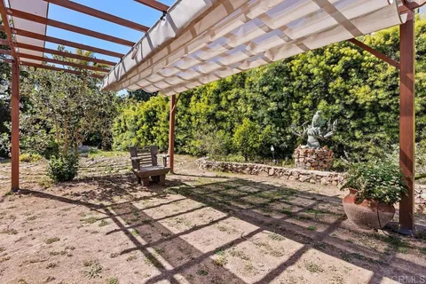 a view of a pathway with a yard
