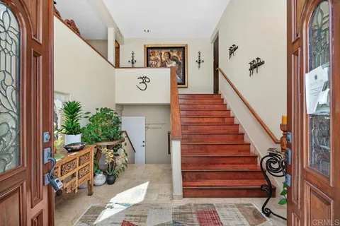 a view of entryway with stairs