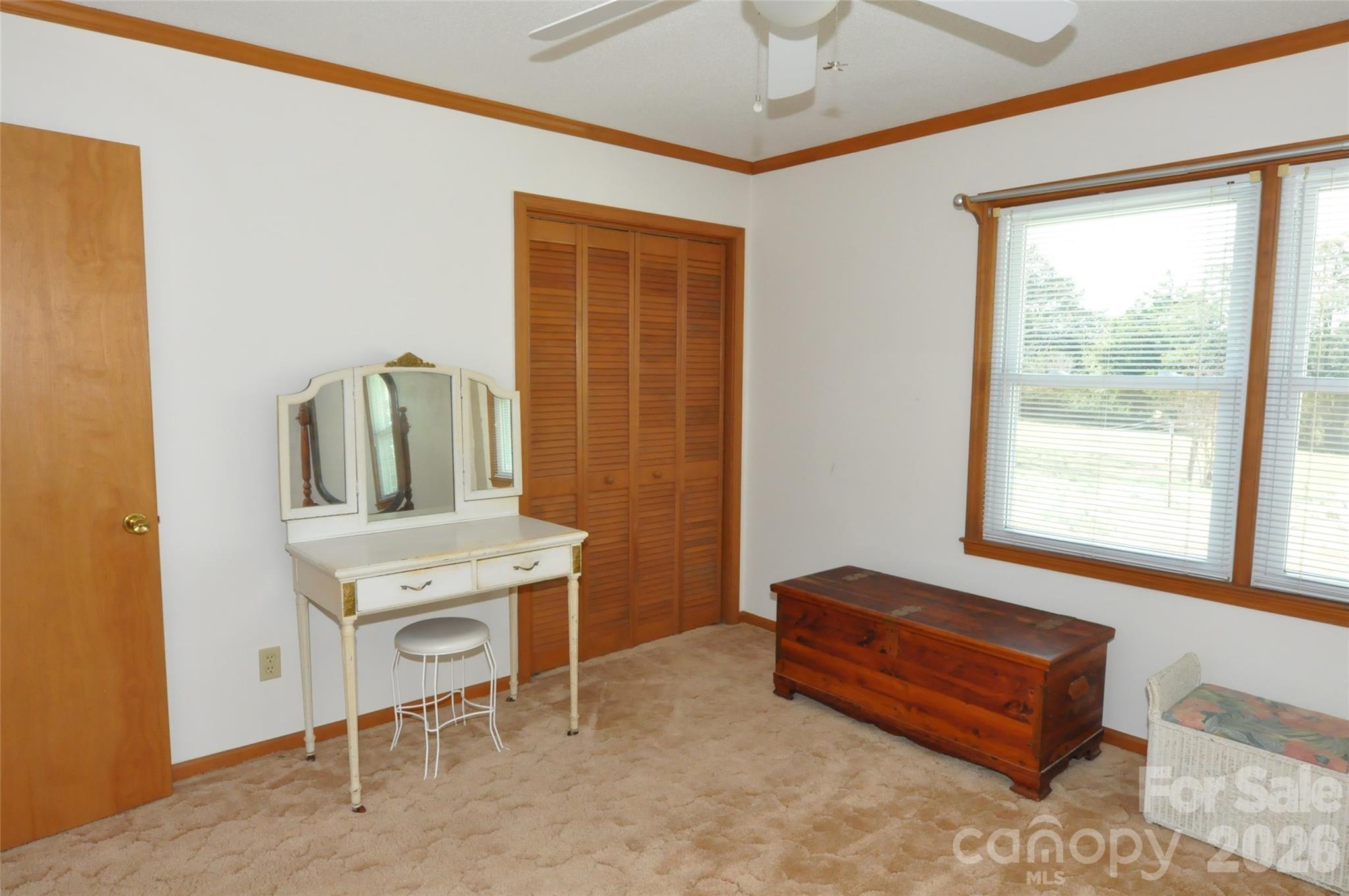 1316 Cornwell Road Blackstock, SC 29014 - Photo 18 of 48 a living room with a bed furniture and a window