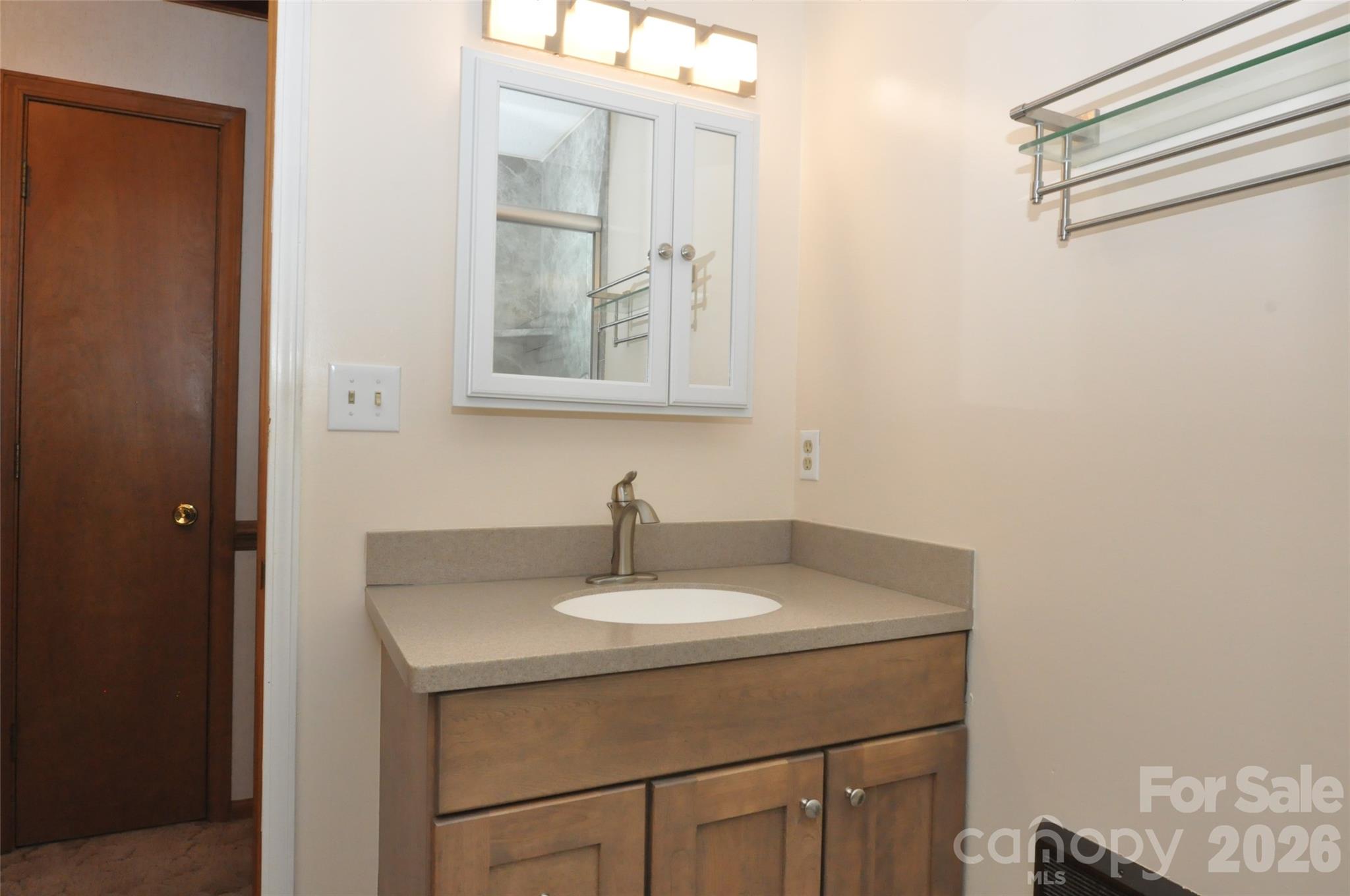 1316 Cornwell Road Blackstock, SC 29014 - Photo 22 of 48 a bathroom with a sink and a mirror