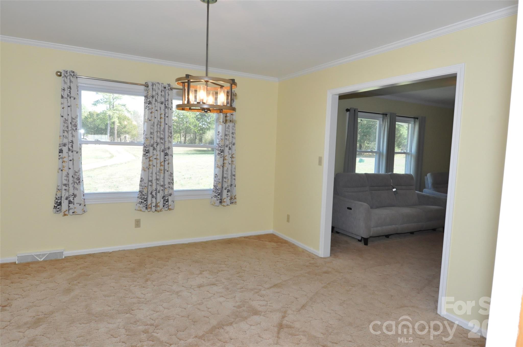 1316 Cornwell Road Blackstock, SC 29014 - Photo 9 of 48 a view of an empty room with a window