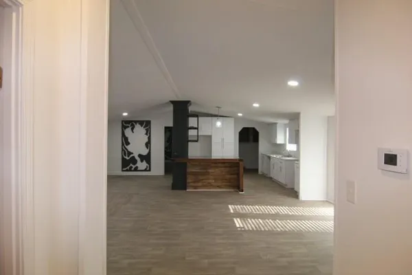 a view of game room with furniture and window