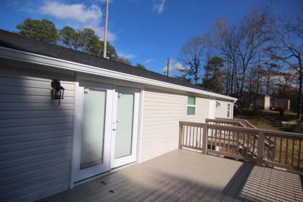a view of a house with a roof deck