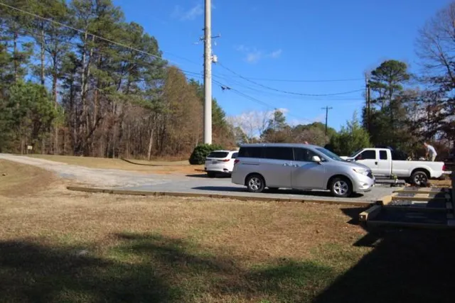 a view of a car parked on the side of the road