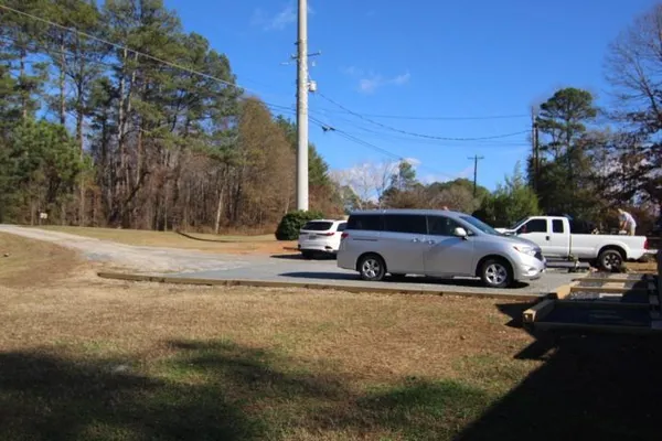 a view of a street with cars