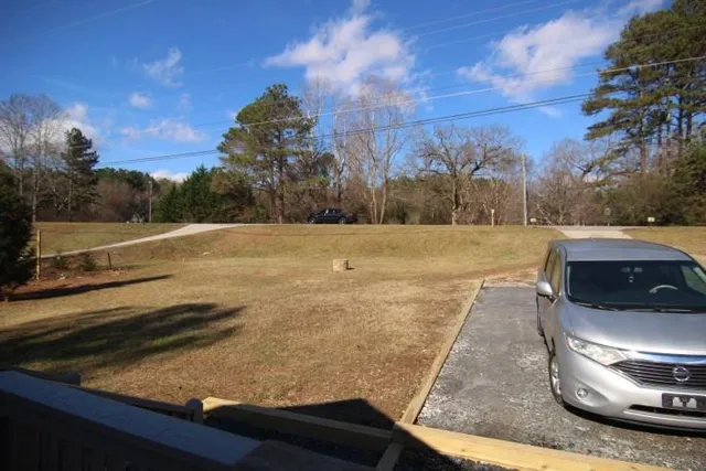 a view of a yard with an outdoor space