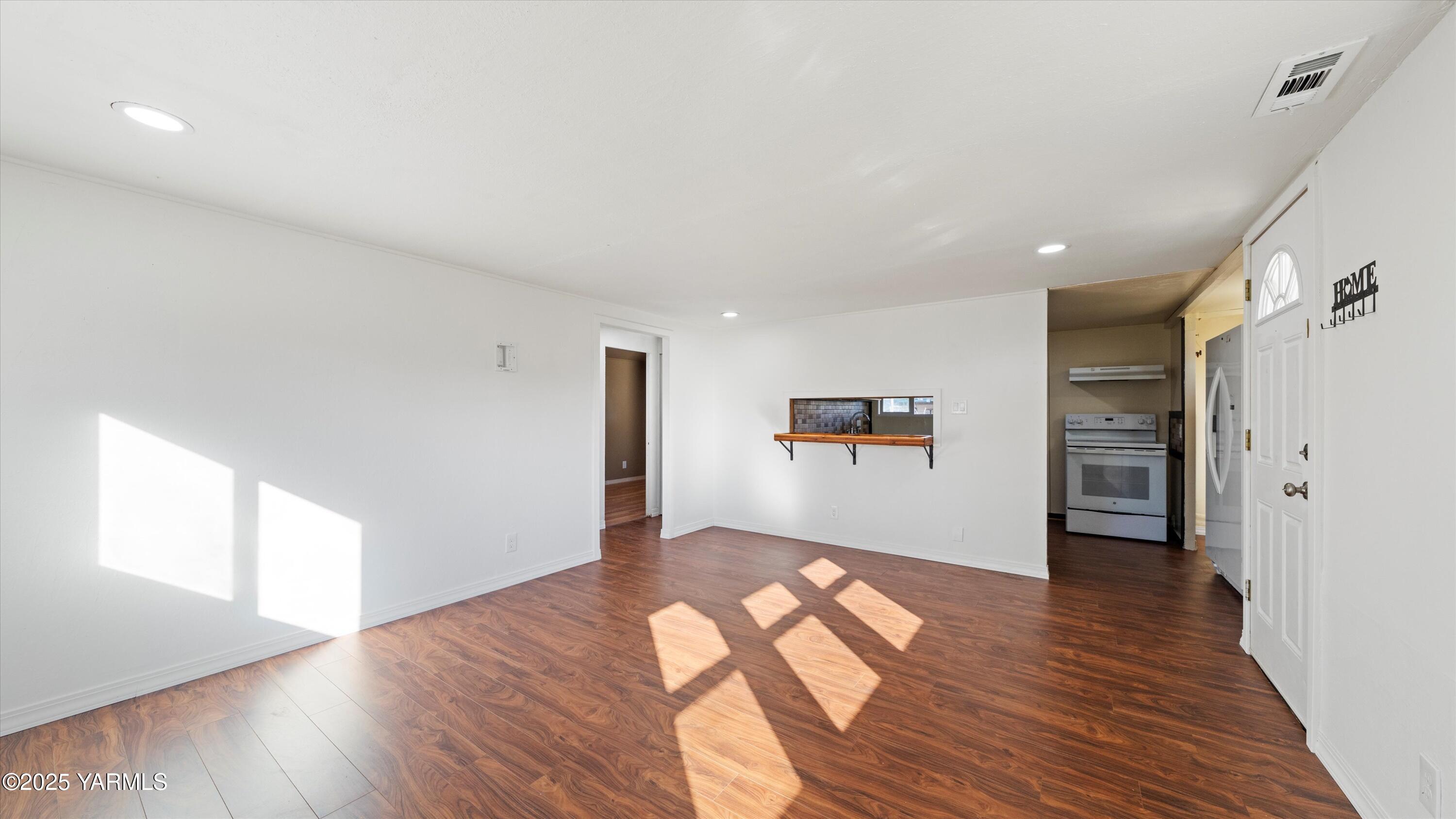 1802 Symons Street Richland, WA 99354 - Photo 23 of 23 a view of empty room with wooden floor