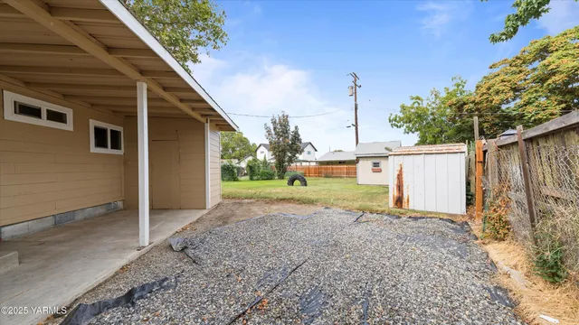 a view of backyard of house
