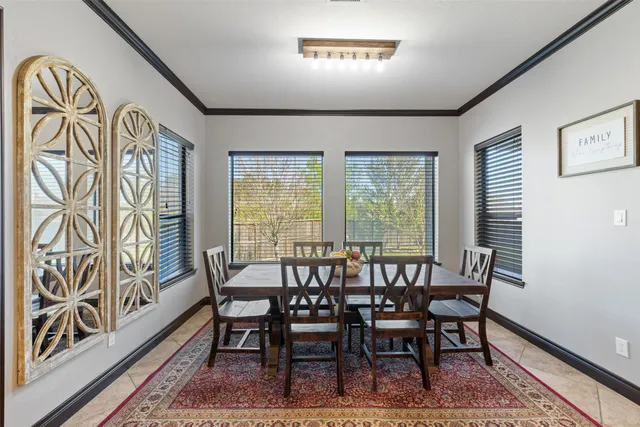 a spacious bathroom with a granite countertop sink and a mirror