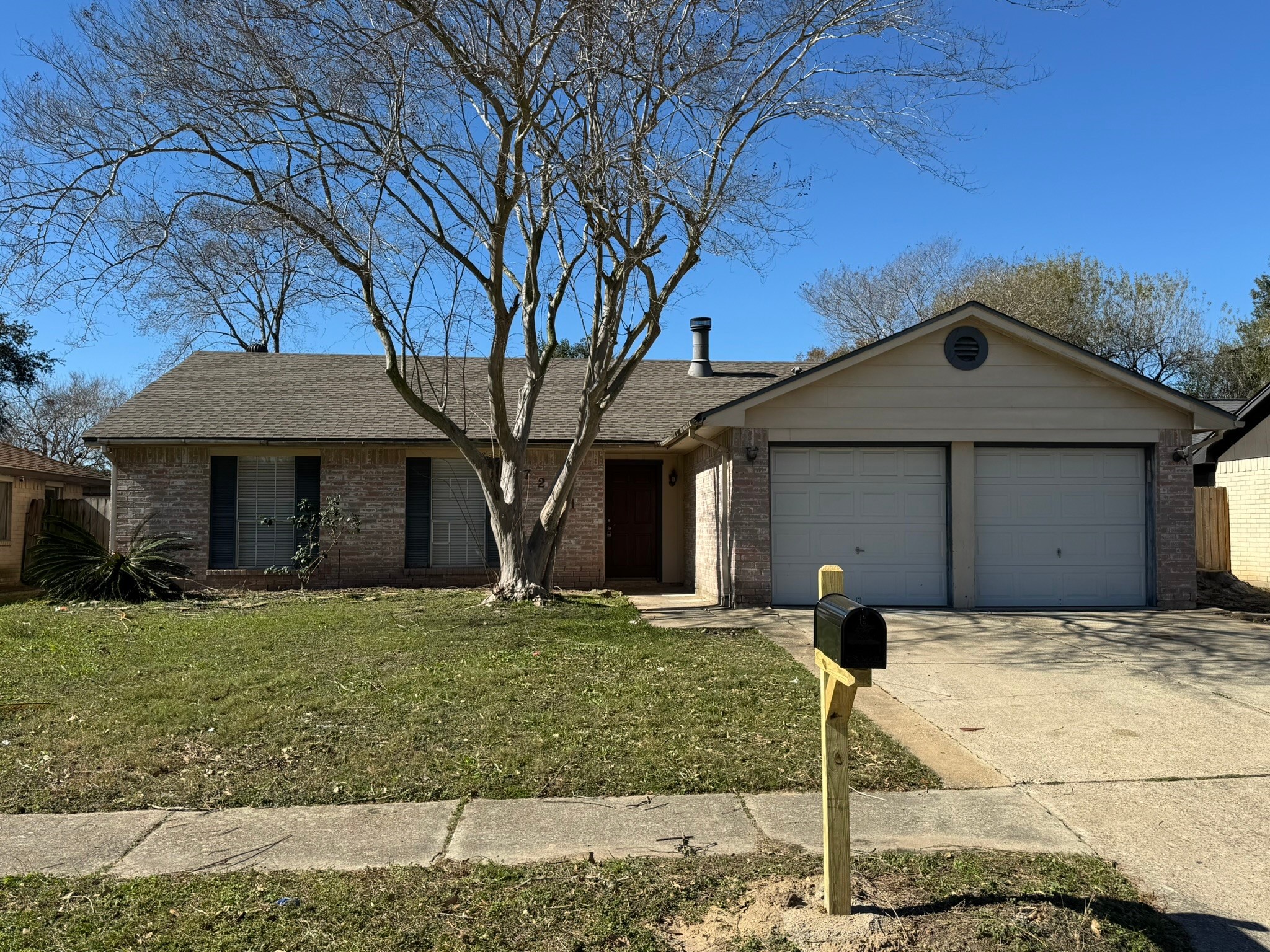 7231 Daylight Lane Houston, TX 77095 - Photo 1 of 11 a front view of a house with a yard