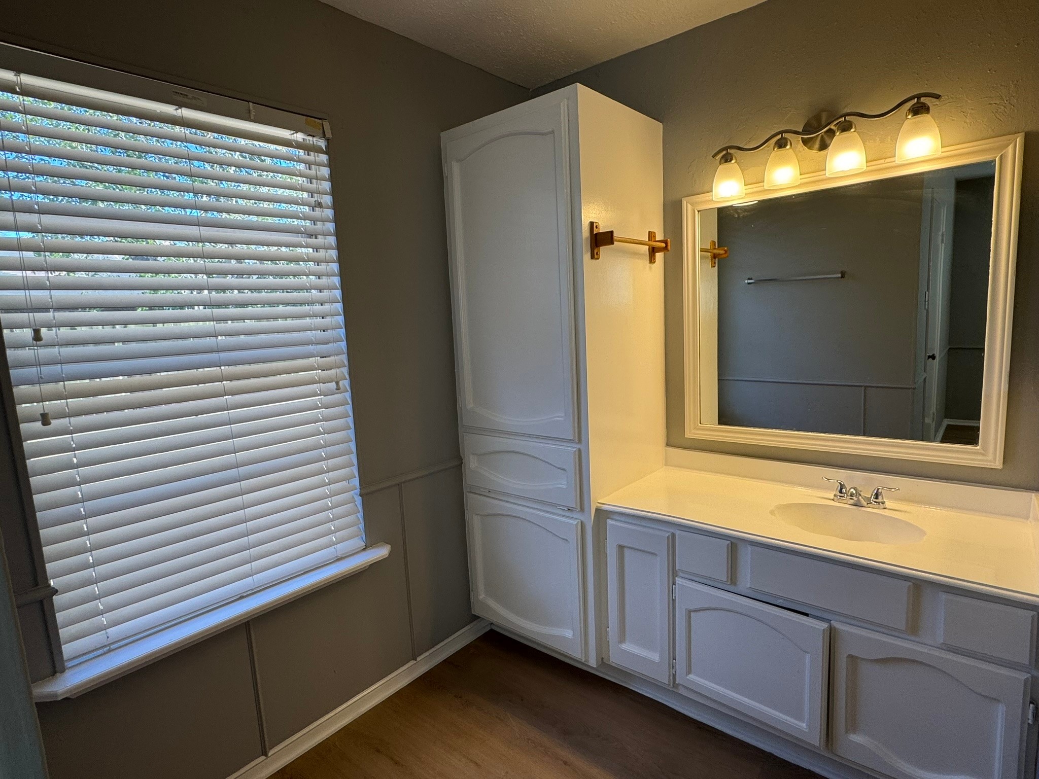 7231 Daylight Lane Houston, TX 77095 - Photo 7 of 11 a bathroom with a sink and a mirror