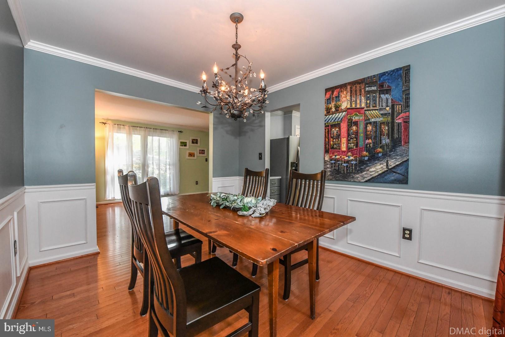 6786 Balmoral Ridge New Market, MD 21774 - Photo 5 of 36 Dining room w H/w and lots of trim detail