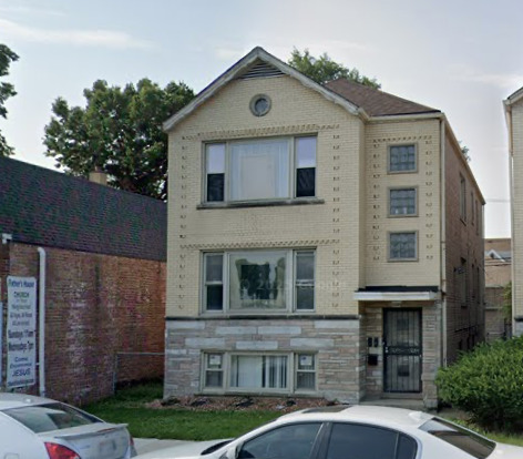 2823 West 71st Street Chicago, IL 60629 - Photo 1 of 18 a front view of a house with a yard