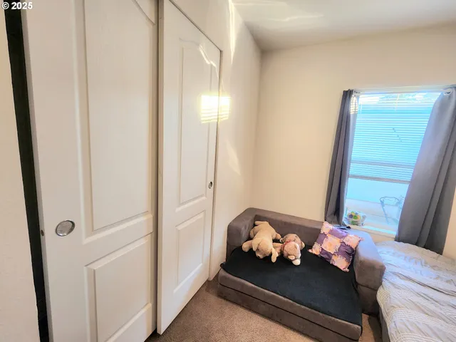 a room with furniture and window