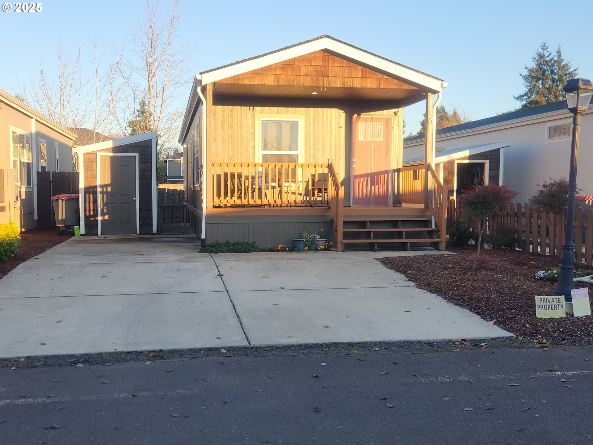 515 Southeast Sheridan Road, Unit 6 Sheridan, OR 97378 - Photo 2 of 30 a view of a house with a yard