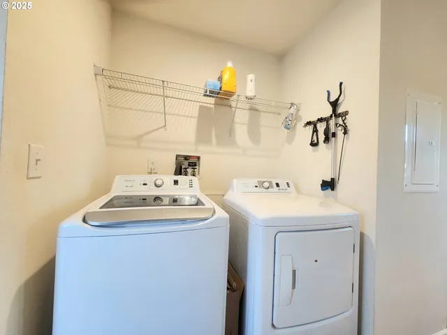 a utility room with dryer and washer